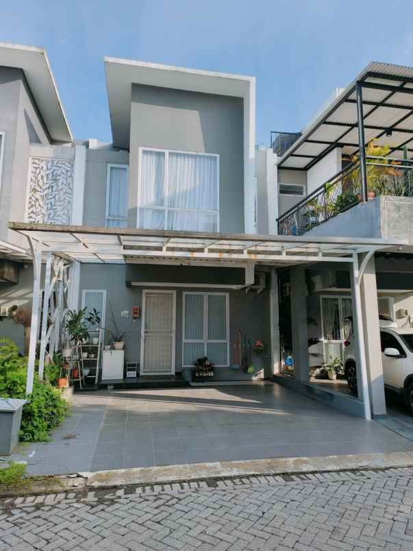 dijual rumah cluster the height jl raya