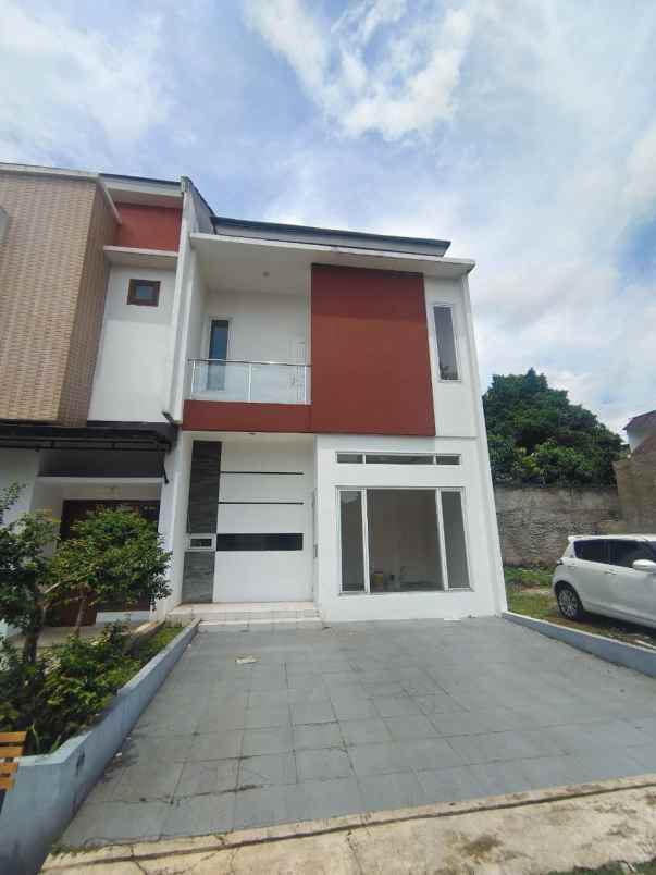 dijual rumah jalan raya muchtar