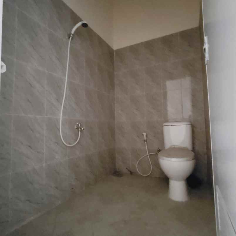 dijual rumah jalan raya muchtar