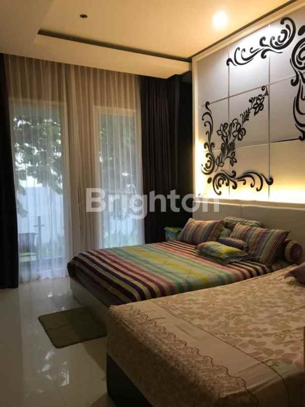 dijual rumah pakuwon city