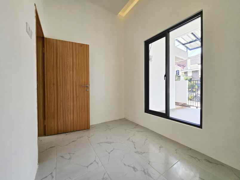 dijual rumah taman harapan baru