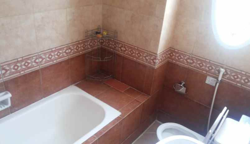 rumah raffles hills jl aternatif