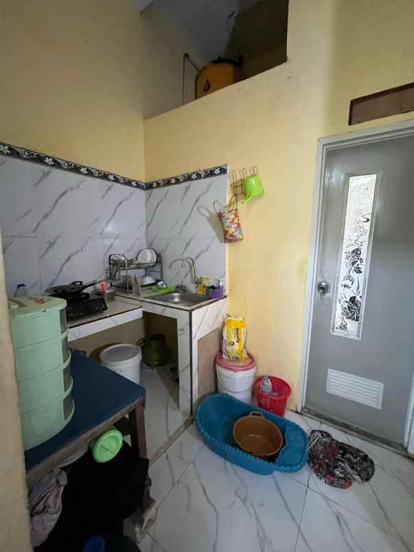 rumah siap huni 5x11 di batas kota surabaya barat