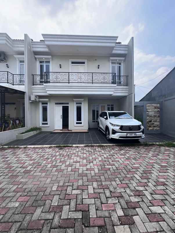 dijual rumah jalan raya kalimulya cilodong