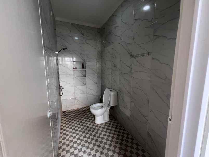 dijual rumah jalan raya kalimulya cilodong
