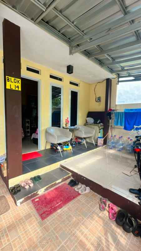 dijual rumah jalan raya meruyung limo