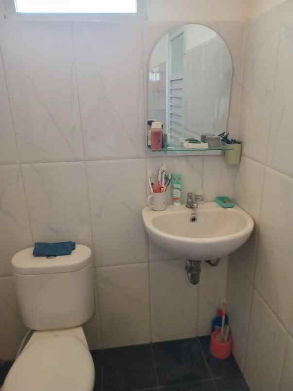 dijual rumah jalan raya meruyung limo