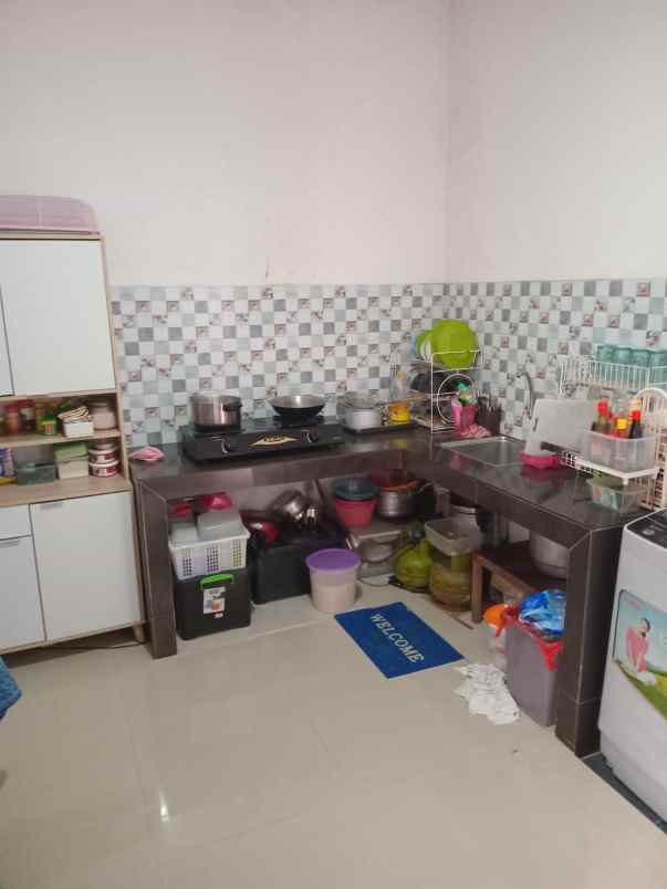 dijual rumah jalan raya meruyung limo