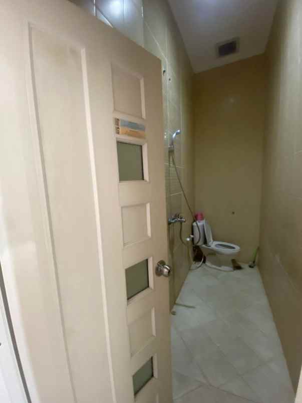 dijual rumah jln hj naman pondok kelapa