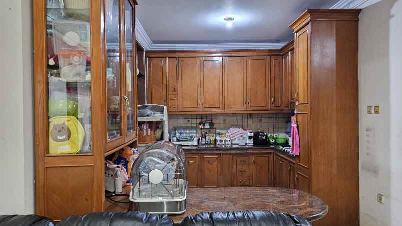 dijual rumah taman holis indah