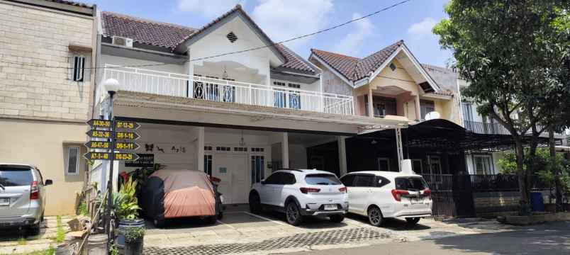 kost 11 pintu dekat universitas gunadarma