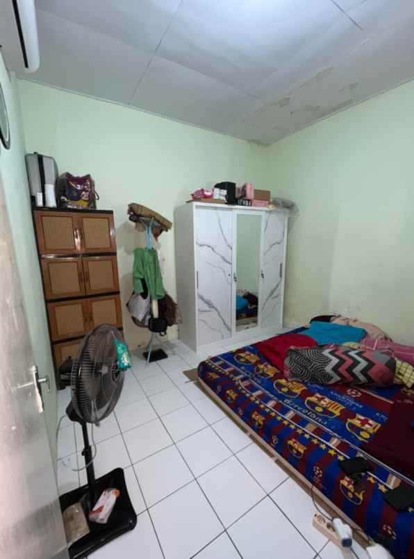 over kredit perumahan puri sava gelam serang