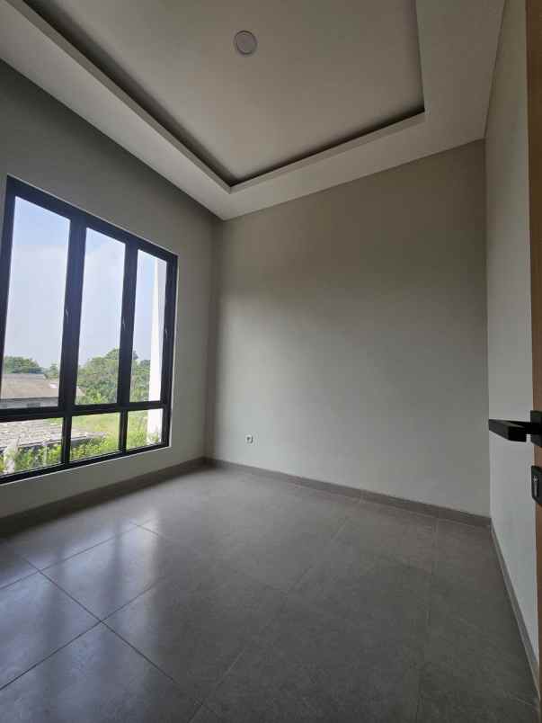 rumah 2 lantai bergaya bali industrial di tapos depok