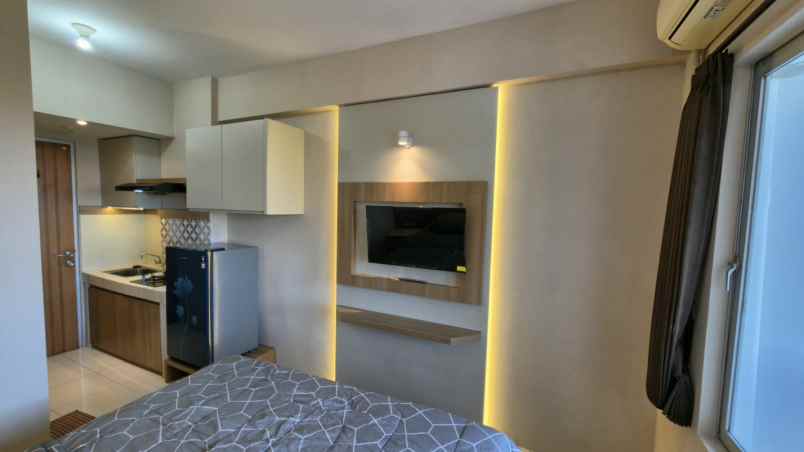 apartemen puncak permai surabaya barat