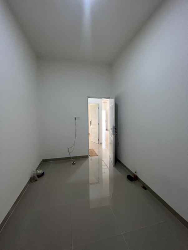 dijual rumah jalan raya benda baru