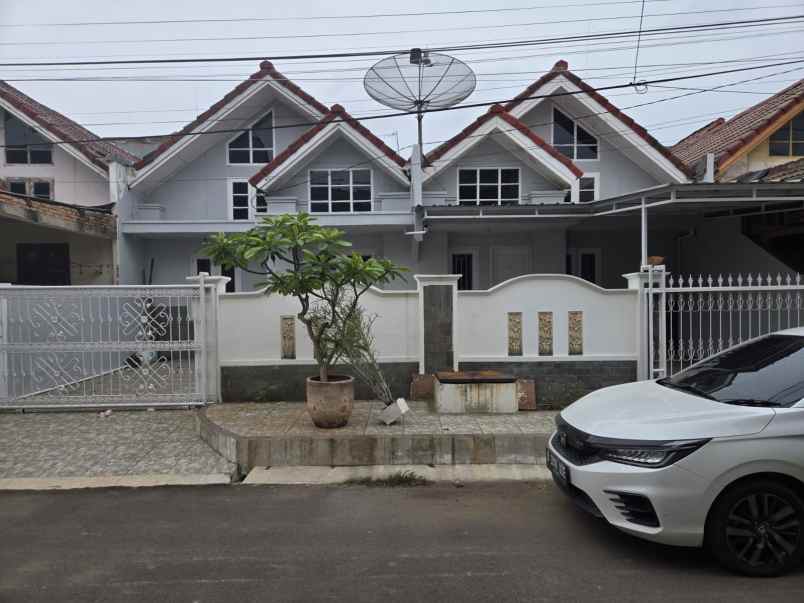 dijual rumah taman harapan baru