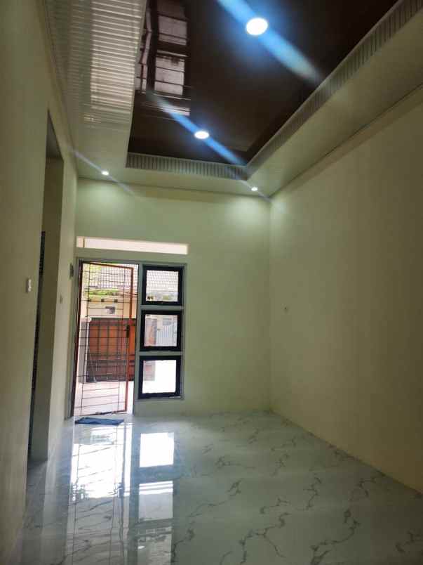 dijual rumah taman harapan baru