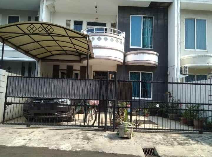 dijual rumah taman modern