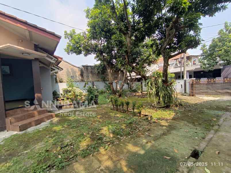rumah dengan tanah luas dibelakang margo city