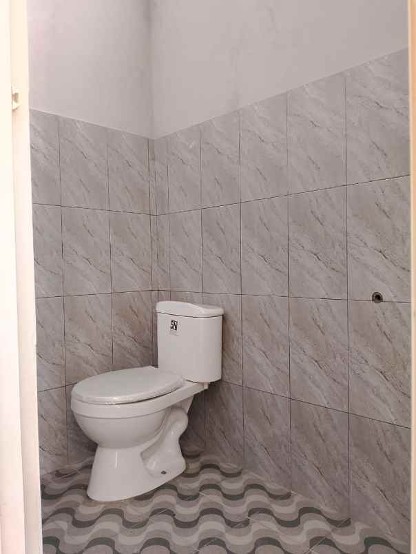 rumah kpr pinggir jalan dekat stasiun krl