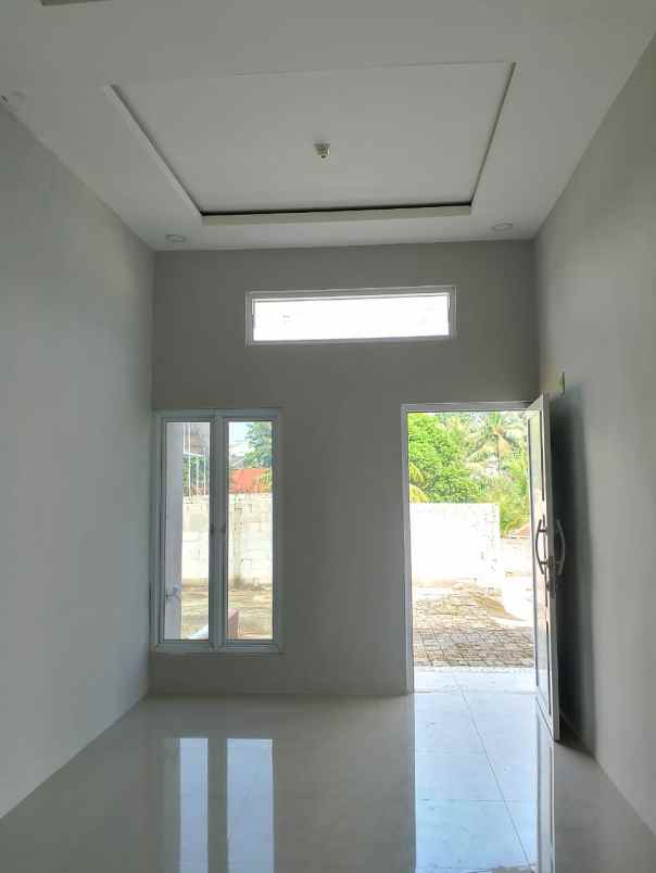 rumah kpr pinggir jalan dekat stasiun krl