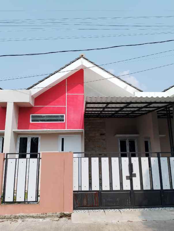 rumah kpr pinggir jalan dekat stasiun krl