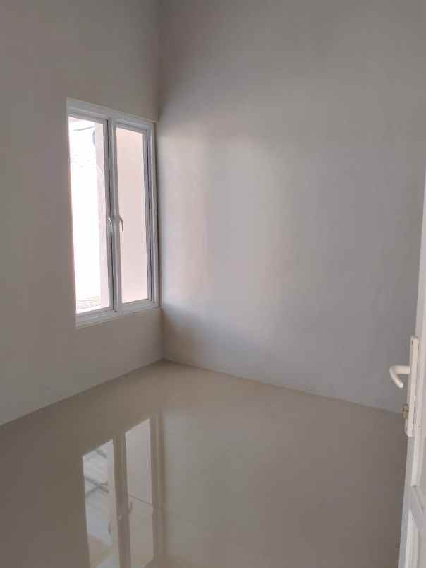 rumah kpr pinggir jalan dekat stasiun krl