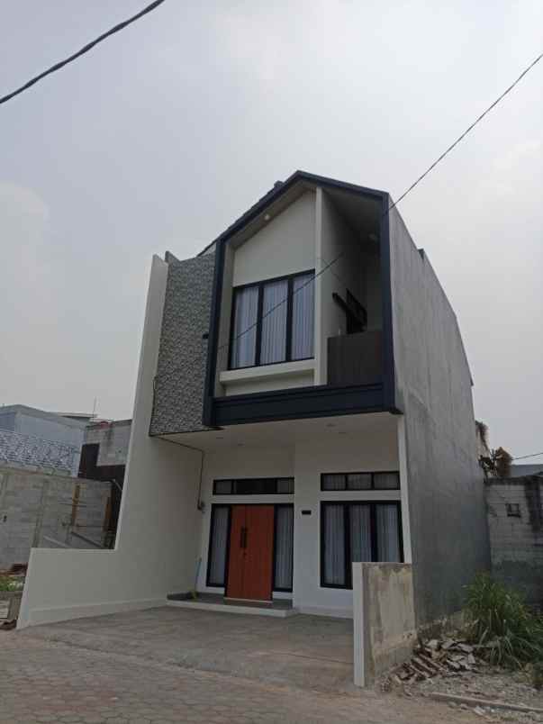 rumah mewah dp 0 galaxy cikunir deket lrt cikunir