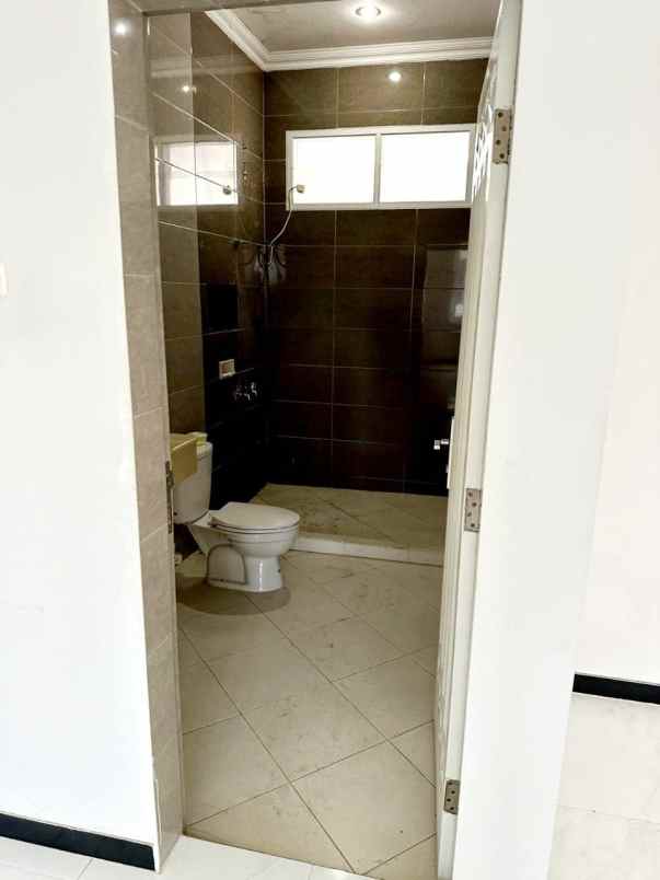 rumah mewah modern dharmahusada megah permai surabaya