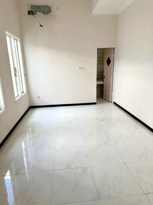 rumah mewah modern dharmahusada megah permai surabaya