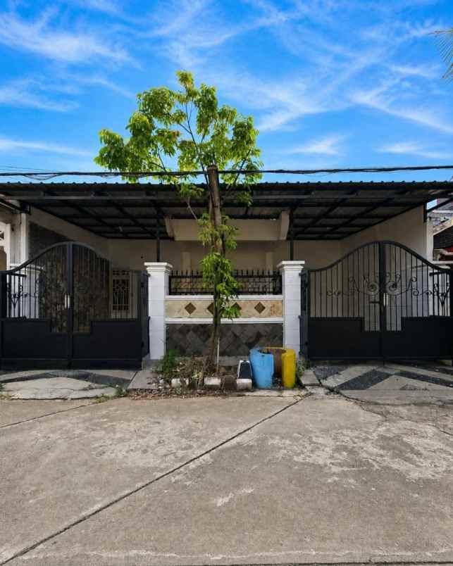 rumah wisma permai strategis siap huni carport 2