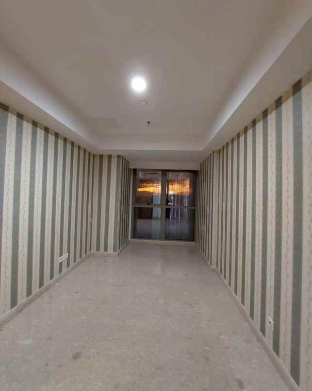 apartemen gold coast pik tower carribean