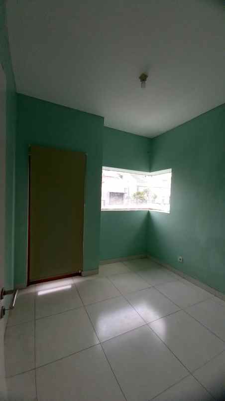 dijual rumah cluster zebrina jgc
