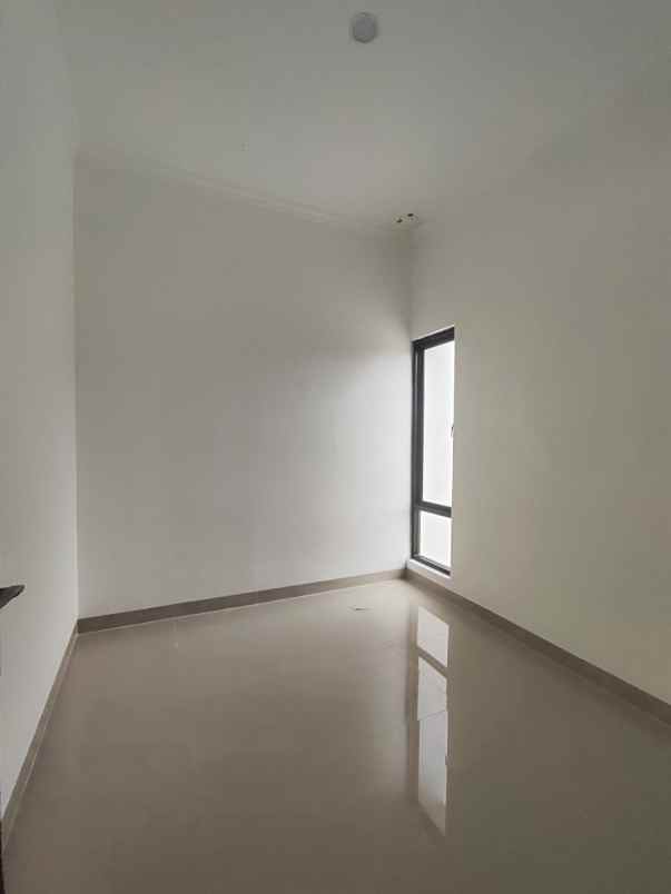 dijual rumah jln raya tapos depok