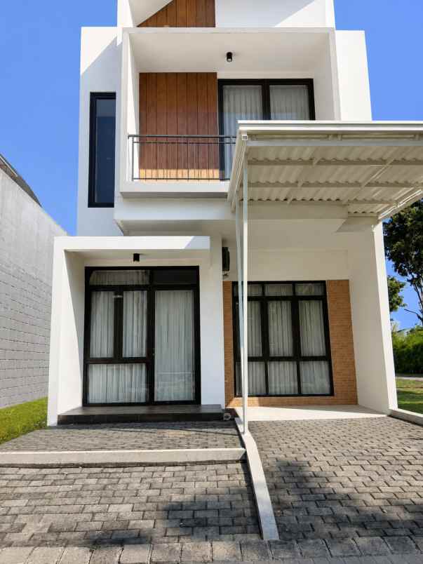 dijual rumah pakuwon city grand island