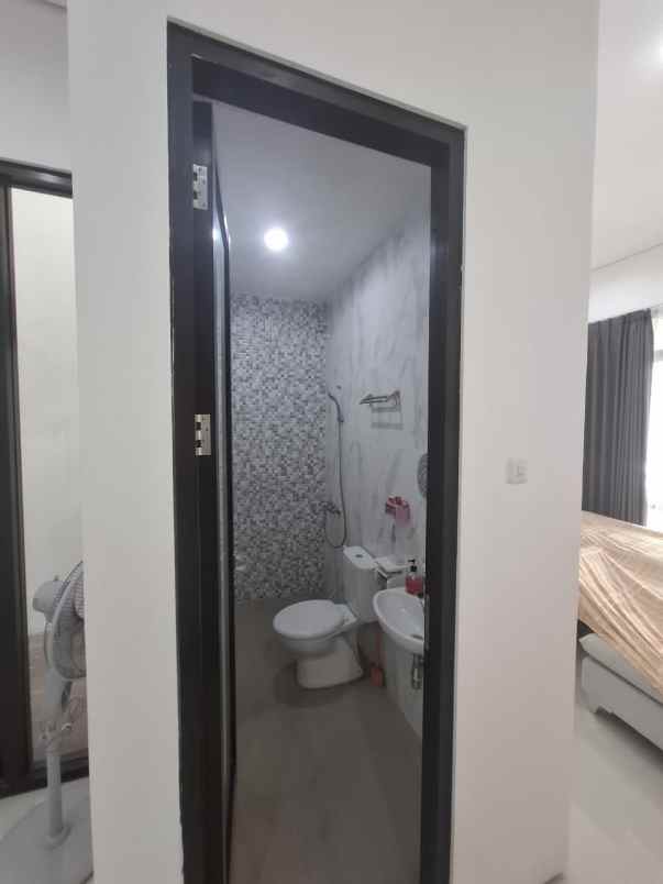 dijual rumah pakuwon city grand island