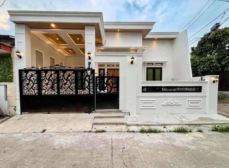 dijual rumah perumahan taman raya