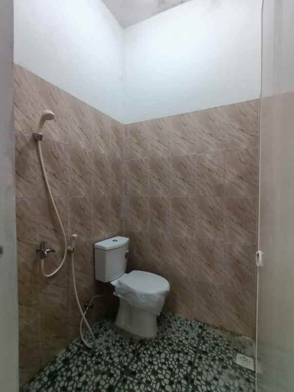 dijual rumah taman harapan baru