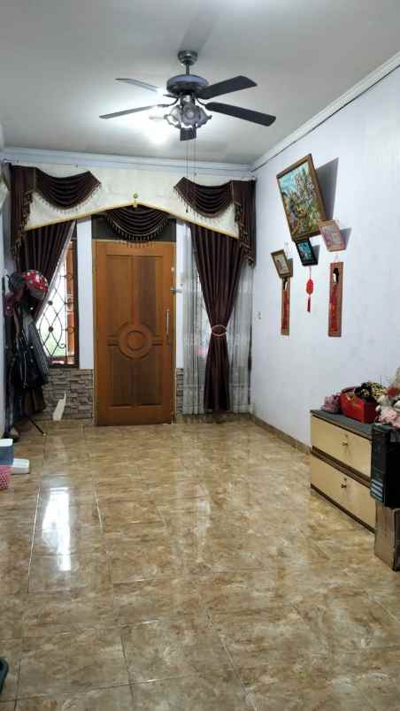 dijual rumah taman royal 1 poris plawad