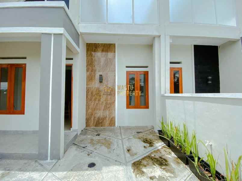 hunian rooftop stylish dengan carport dan smart lock