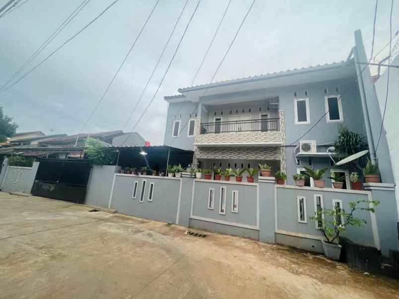 jual rumah komplek dengan kolam renang