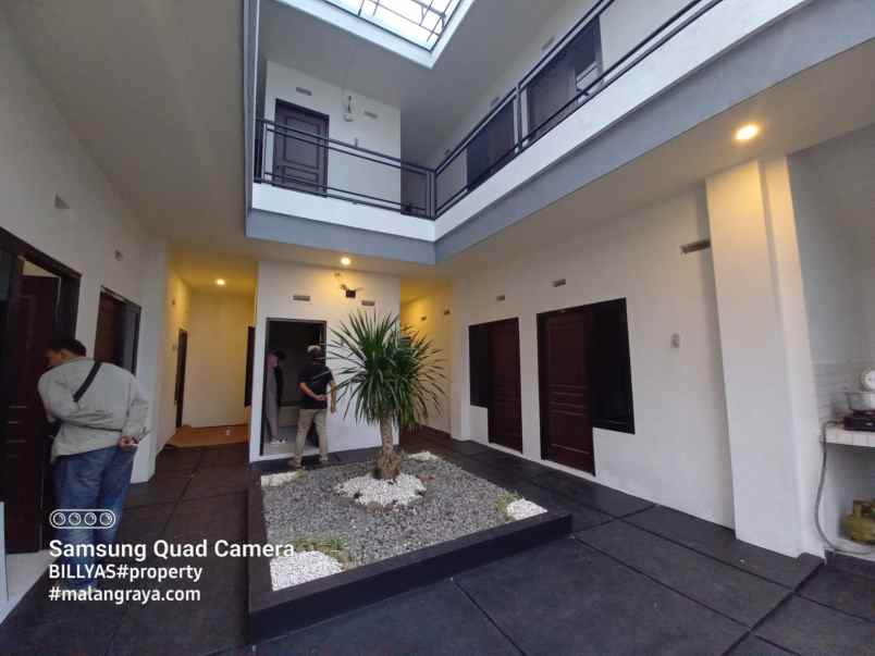 kost jl bendungan sigura gura