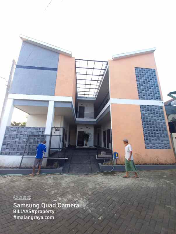 kost jl bendungan sigura gura