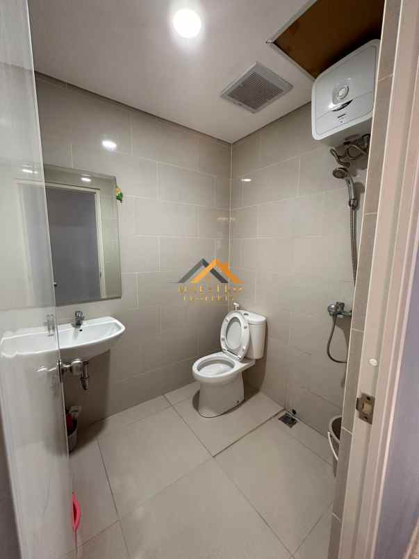 dijual apartemen podomoro city deli tower