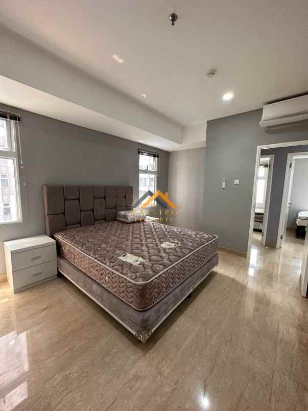 dijual apartemen podomoro city deli tower