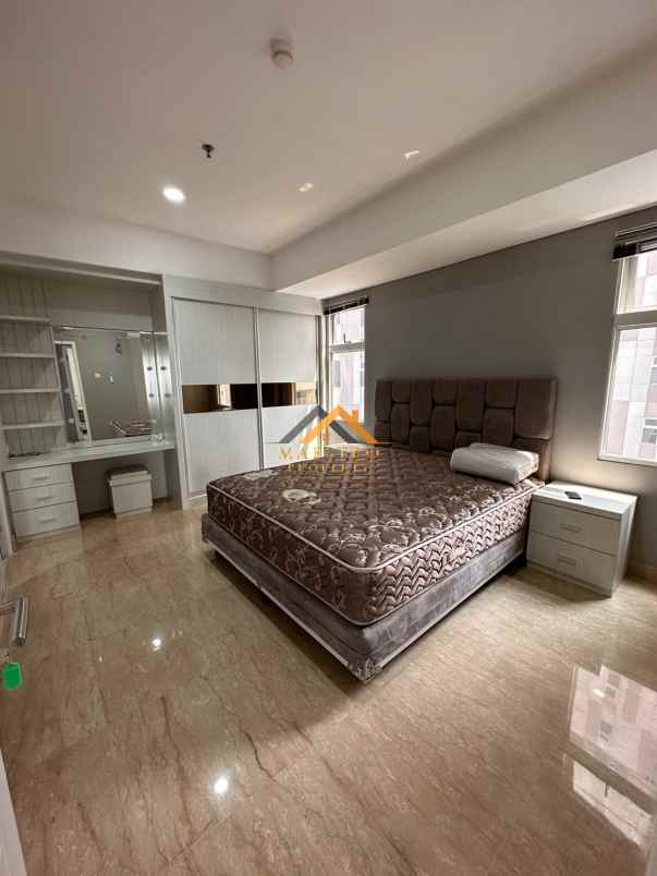 dijual apartemen podomoro city deli tower