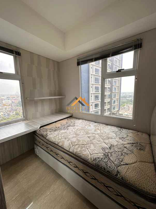 dijual apartemen podomoro city deli tower