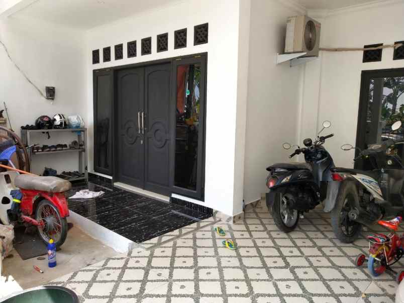 dijual rumah cluster harapan indah