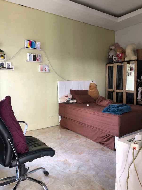 dijual rumah jalan raya muding