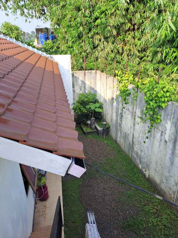 dijual rumah jln raya kalimulya
